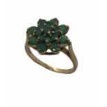 A 9ct gold emerald cluster ring, size M1/2