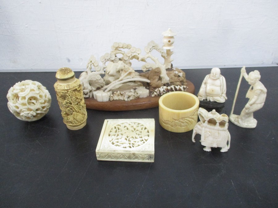 A collection of early 20th century ivory, bone including a Chinese seven layered ivory puzzle ball