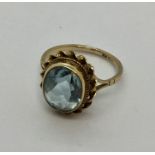 A 9 ct gold blue topaz ring