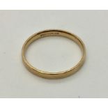 A 9ct gold wedding band. Weight 2g