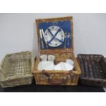 An Optima wicker picnic basket along with two wicker trays