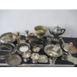 A collection of silver plated items including a large trophy to Falmouth Rugby & Cricket club, 1921