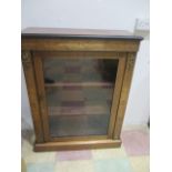 An Edwardian inlaid small glazed bookcase