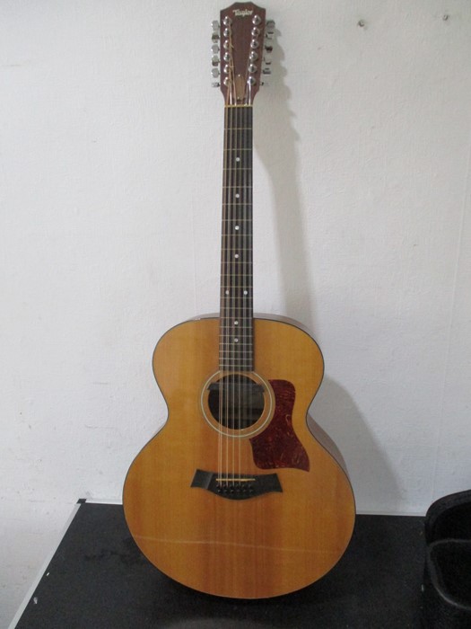 A Taylor 12-string acoustic guitar in carry case - model 355