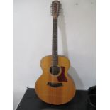 A Taylor 12-string acoustic guitar in carry case - model 355