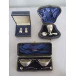 A hallmarked silver Christening set, pair of cased silver salts ( spoon A/F) and cased silver