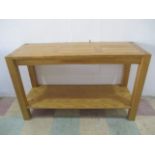 A contemporary oak console table