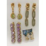 Four pairs of 9ct gold earrings. Total weight including stones 19.1g