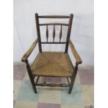 A country rush seated chair with bobbin turned detailing