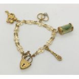A 9ct gold charm bracelet. Total weight 14.7g