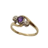 An amethyst and diamond ring set in 9ct gold, size N