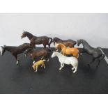 A collection of eight Beswick horses