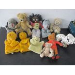 A collection of various vintage teddies, puppets etc