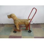 A Pedigree Soft Toy Ltd. pushalong dog