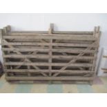 A collection of 5 vintage wooden hurdles