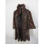 A vintage fur coat with hat and shawl