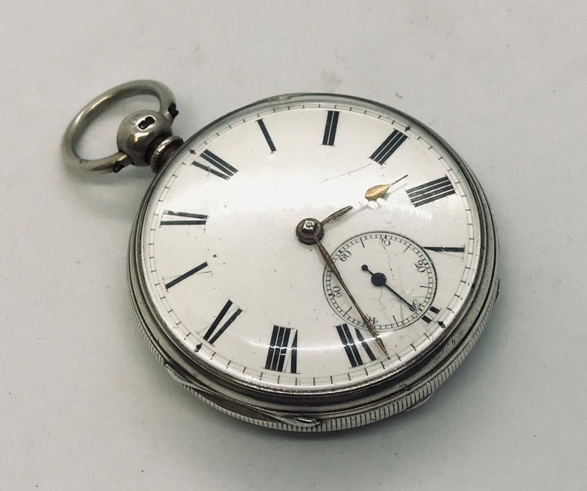 A hallmarked silver pocket watch with subsidiary second dial