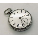 A hallmarked silver pocket watch with subsidiary second dial