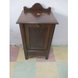 An Edwardian fall front coal box