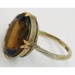 A 9ct gold ring set with a smoky topaz