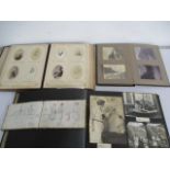 Three photograph albums along with a sketch book with drawings of Bulgaria, Hungary and Eastern