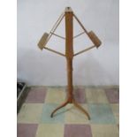 A wooden duet music stand