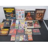 A collection of eight country music books, along with various music related DVD's, cassettes & CD's