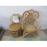 A wicker chair, along with wicker table and mirror
