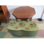 An Edwardian octagonal centre table, along with an Ottoman.