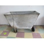 A large vintage galvanised trolley - height 82cm length 116cm