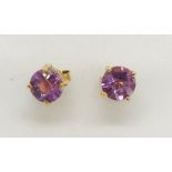 A pair of 9ct gold and amethyst earrings