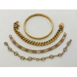 A collection of 9ct gold bracelets, bangle etc. Total weight 40.6g