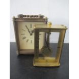 An unusual Kaiser 8 day 7 jewel brass carriage clock along with Smiths quartz carriage clock
