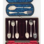 A hallmarked silver christening set A/F along with a set of silver plated coffee spoons (tongs