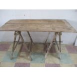 A small antique trestle table, base A/F