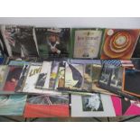 A collection of vinyl records including The Rolling Stones (including box set) ELO, Elton John,
