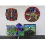 A collection of five stained glass panels