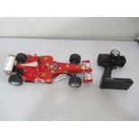 A boxed Carimsa Ferrari F2002 formula one radio control car