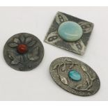 Three Ruskin style brooches