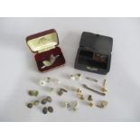 A collection of various cuff links including silver etc