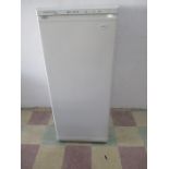 A Frigidaire upright freezer