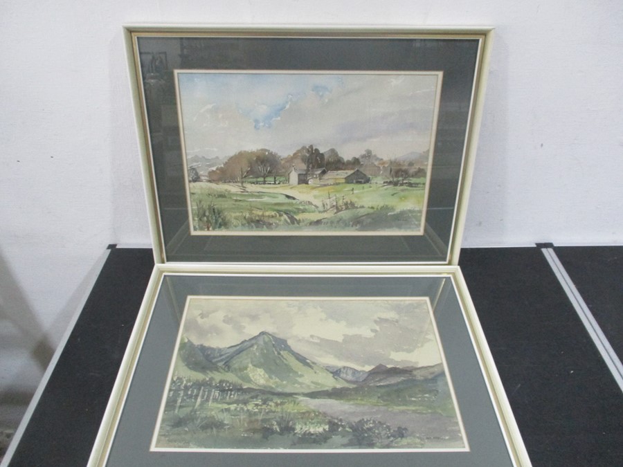 Two framed watercolours signed by M.M.Wadey, one of a landscape plus one other.