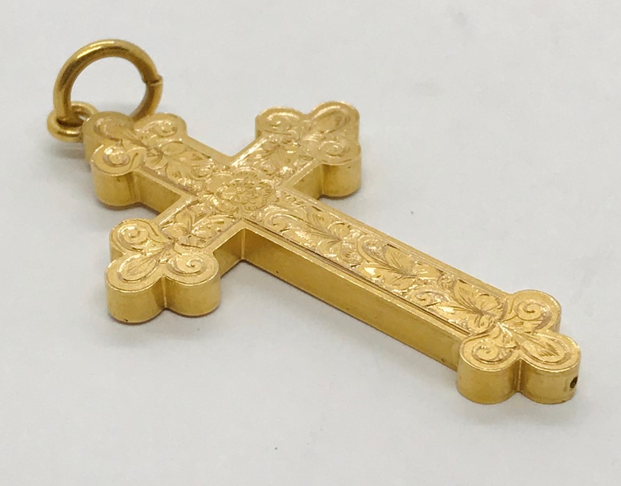 An Edwardian 15ct gold cross. Weight 8.2g