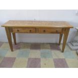 An oak two drawer buffet with parquetry top