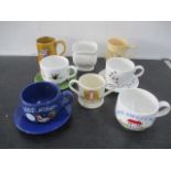 A collection of Wade china including a Taunton Cider two handled mug