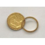 A 22ct gold wedding band along with a 22ct full sovereign (with remains of pin clasp to reverse).