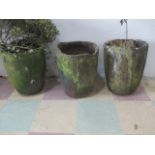 Three crucibles re purposed as planters, each approx. 42cm height