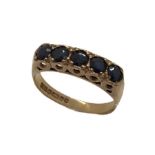 A 9ct gold ring with five sapphires