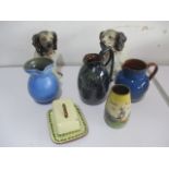 A collection of pottery including a pair of Spaniels with bead eyes, Torquay ware, Flemish jug, C