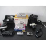 A collection of various cameras etc. including Nikon F-50,Sony CD walkman ( DE-200)Sankyo cine